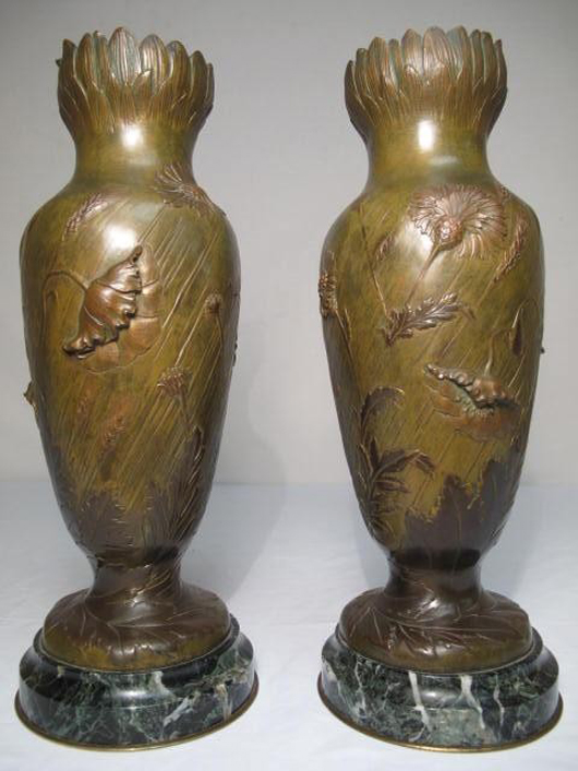 Pair of fine Art Nouveau bronze vases by Abel, French, circa 1900, signed 'Abel' near base, each 13 1/2 inches tall by 4 1/2 inches wide. Estimate for pair $1,800-$2,600. Auctions Neapolitan image.
